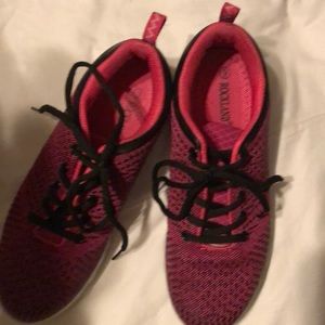 Pink and black tennis shoes